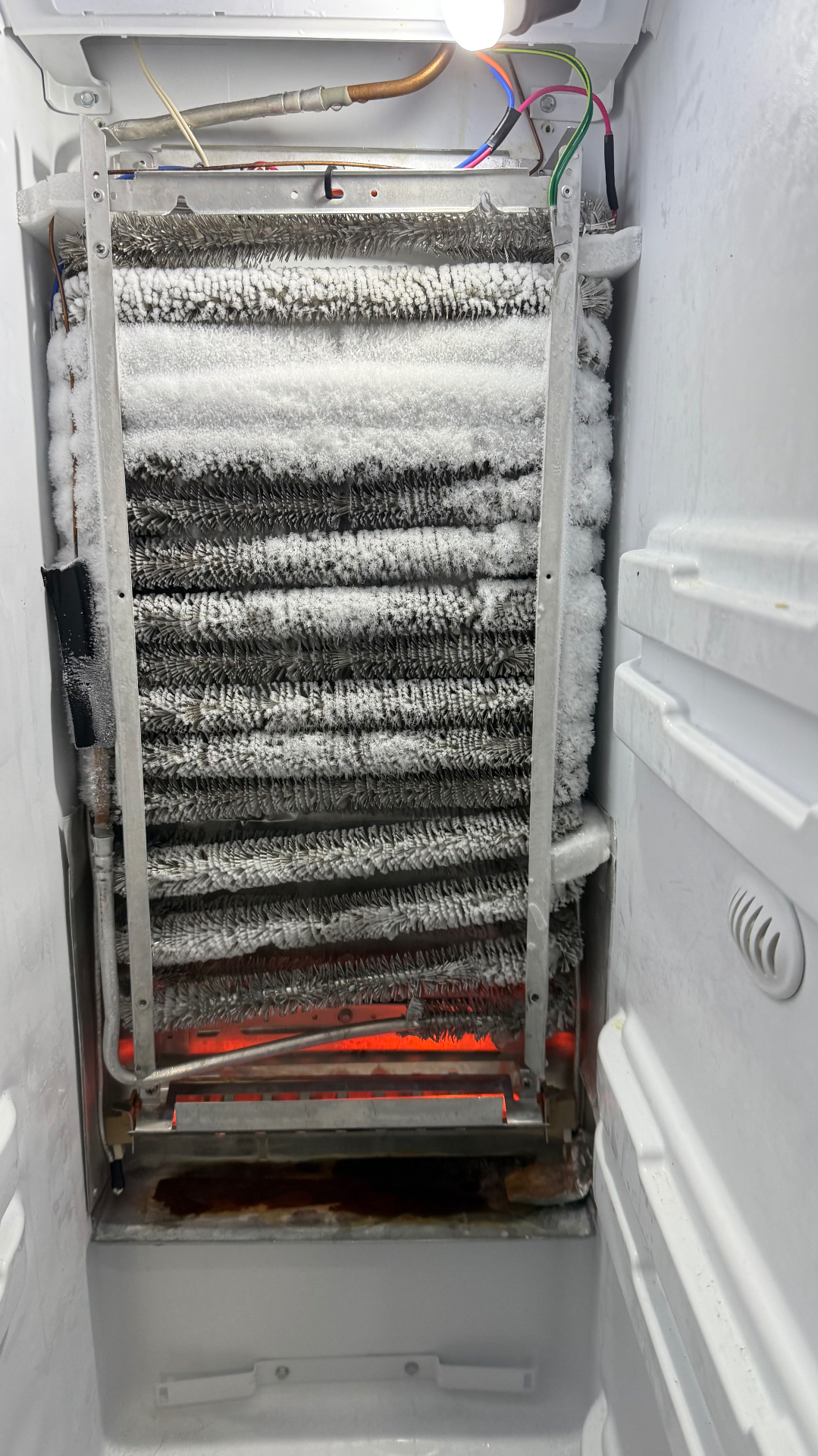Ice accumulation on a cooling coil
